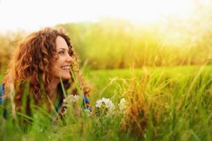 girl smiling in the field