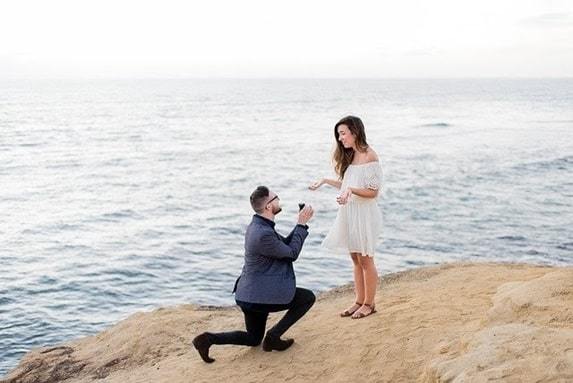 propose on a beach