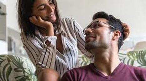 couple is looking into eyes with smile
