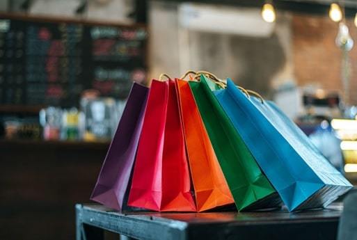 colorful paper bags on table