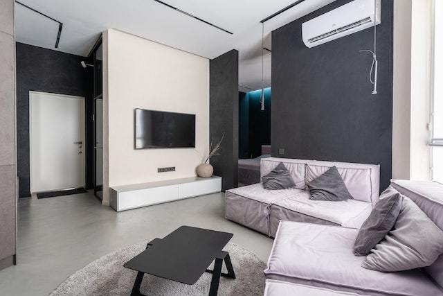 black and grey living room with ac