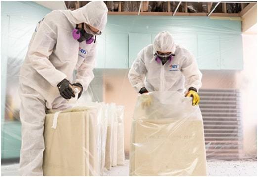 workers in safety costume