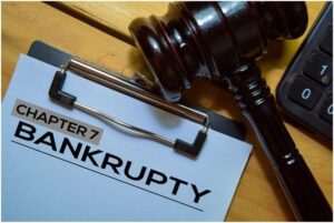 8 Key Factors to Consider Before Filing for Bankruptcy bankruptcy chapter 7 text on document form and gavel isolated on office desk