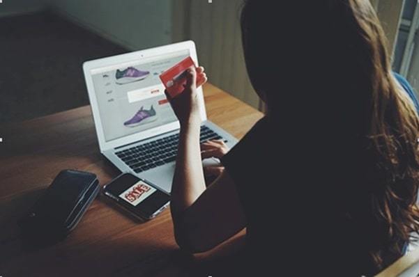 woman using smartphone for online shopping
