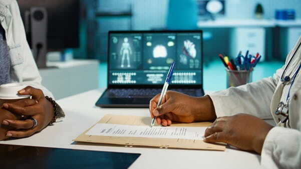 physician signing prescription paper provide antibiotics young girl