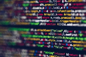 6 Compliance Priorities for Government Financial Operations close-up of colorful code on a screen, representing web development and programming