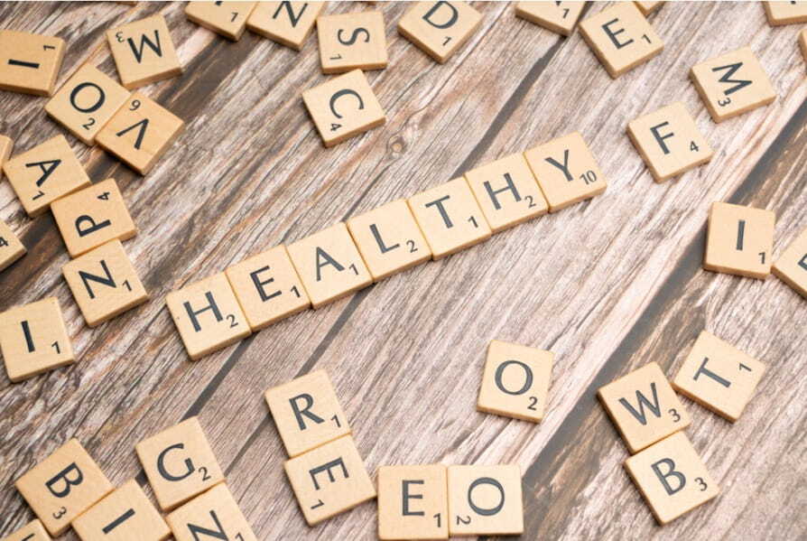 the word healthy spelled out in scrabble letters